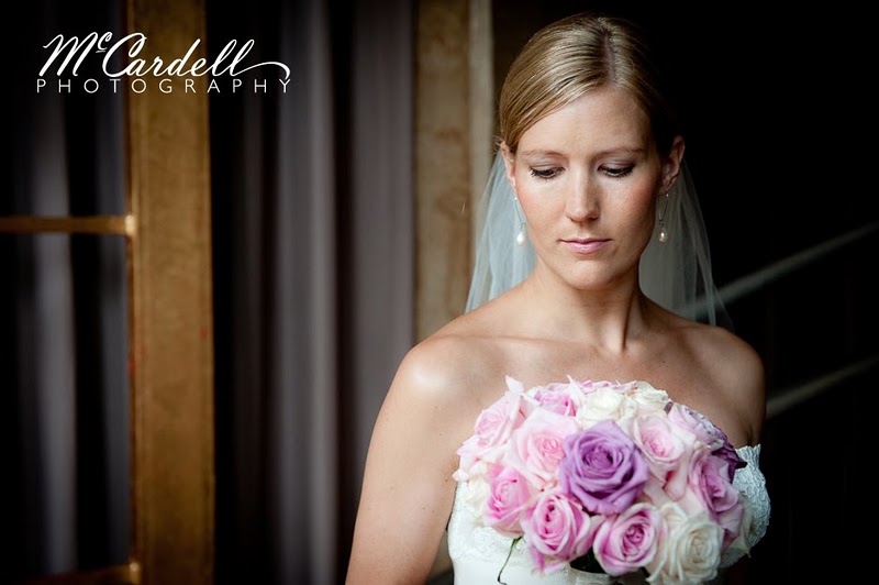 The bride's bouquet was a mix of lilac pale pink and cream roses a very 